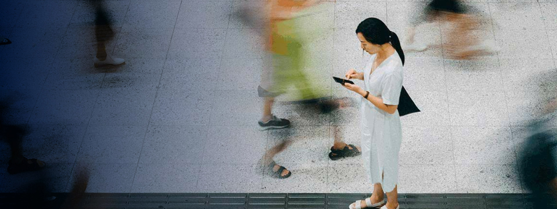 woman looking at her phone